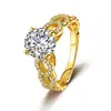 Anillo de Grupo Clásico de Cuatro Garras Incrustado Chapado en Oro de 18K Color D Plata de Ley S925 Moissanita Anillo de Compromiso Venta Directa de Fábrica
