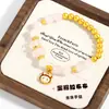 Tienda de Oro Mismo Estilo Pulsera Labubu de Cristal Rosa Natural Oro Arena Accesorios DIY Pulsera de Cuentas de Cristal Doradas Hecha a Mano