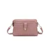 Bolsa Feminina 2025 Nova Primavera e Verão Jovem Cor Sólida Casual Versátil Bolsa Feminina Tecida Ombro Transversal Bolsa Pequena Tecida