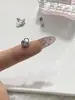 Aretes de Hueso de Oreja de Tornillo de Perla Flor de Iris Diseño de Nicho Femenino Sentido de Diseño Exquisitos de Moda Elegantes para el Cartílago