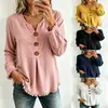 Top casual de moda para mujer, otoño 2026, transfronterizo europeo y americano, color liso, cuello en V, abotonado, holgado, manga larga, con flecos