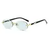 Gafas de Sol de Alta Gama Transfronterizas Europeas y Americanas con un Diseño Único y Versátil, Protección Solar de Moda, Gafas de Sol Retro Ovaladas sin Marco Metálico con Bordes Cortados