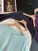 Cardigã de cashmere escovado estilo novo 2026 para mulheres, gola redonda, top de tricô macio e confortável, disponível em várias cores, versátil e fácil de combinar