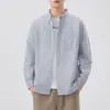 Camisa de manga larga 2026 moda primavera y otoño camisa de rayas para hombre chaqueta casual holgada versátil top chaqueta