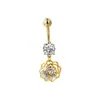 En stock venta caliente perforación corporal humana anillo de ombligo flor hueca con taladro clavo de ombligo personalidad nicho moda hebilla de ombligo