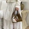 Bolso Vintage de Nicho para Mujer 2026 Elegante Nuevo Bolso Cubo Simple de Alto Valor Cruzado Bolso Madre-Hija