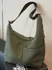 Bolsa transversal minimalista casual de nicho, bolsa tote de grande capacidade para o trabalho, cor sólida, estilosa, personalidade artística, bolsa de ombro único