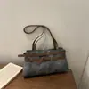 Moda transfronteriza comercio exterior retro simple gran capacidad 2026 nuevo estilo cinturón de cuero moda casual bolso de hombro para mujer