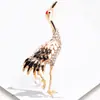 Fabricantes transfronterizos Estilo coreano de venta caliente grulla aleación Broche ramillete accesorios para traje pin temperamento simple popular para mujer