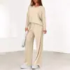 Conjunto de duas peças feminino europeu e americano transfronteiriço, top de malha de gola V de manga comprida com listras verticais e calça pantalona solta e fluida