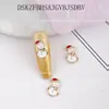 Joyería para uñas navideña transfronteriza celebridad de internet aleación calcetines de Navidad sombrero de Navidad alce taladro de uñas joyería al por mayor