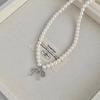 Collar de Perlas de Cristal de Lujo Ligero Nicho de Alta Gama con Colgante de Lazo para Mujer 2024 Nuevo Estilo Cadena Clavicular Cadena para el Cuello