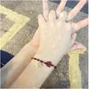 Cinabrio florecita roja Pulsera de la suerte de la marca, te da una pulsera de florecita roja, cuerda roja tejida a mano, pulsera étnica al por mayor