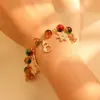 Pulseira Nova de Natal Europeia e Americana Transfronteiriça Criativa Versátil Pingente de Árvore de Natal Velho Boneco de Neve Explosão Cristal Pulseira para Mulheres