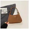 Nova Bolsa Vintage em Relevo Baguete de Ombro para Mulheres 2026, Bolsa de Ombro com Alça de Nó Simples, Bolsa de Nicho Estilo Coreano para o Dia a Dia
