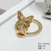 Soporte para Teléfono Móvil Mariposa con Brillo Transfronterizo Carga Inalámbrica Magnética Anillo Plegable Adhesivo Trasero Soporte para Teléfono Móvil Succión Magnética Universal