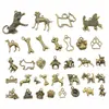 100G/Paquete Accesorios para Joyería DIY Accesorios de Aleación de Zinc Color Bronce Antiguo Mezcla Aleatoria de Accesorios de Hueso y Pata de Cachorro