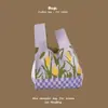 Bolsa de mão de tricô de alta qualidade com retenção automática, blocos de cores retrô, alça de pulso, versão coreana, bolsa de gato, bolsa versátil para mulheres