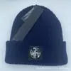 Sombreros de Otoño e Invierno Comercio Electrónico Transfronterizo Sombreros de Punto para Hombres y Mujeres Ropa de Trabajo Casual Europea y Americana Sombreros Cálidos para el Frío Sombreros de Lana Bordados con Letras