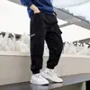 Pantalones de trabajo para niños, nuevos de primavera 2026, pantalones modernos estilo coreano para niños, pantalones largos versátiles para niños mayores
