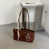 Bolsa de ombro feminina de poá nicho francesa, nova moda versátil 2026, bolsa de axila casual simples