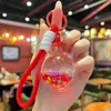 Llavero de Acrílico Creativo con Líquido, Aceite y Brillo de Arena Movediza, Colgante para Coche, Decoración para Bolso de Niña, Regalo Exquisito