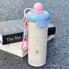 Botella de agua aislada de acero inoxidable 316, diseño elegante y lindo, perfecta para mujeres, con un toque de lujo y un asa portátil