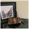 Bolso de hombro transfronterizo retro elegante con estampado de leopardo para mujer, nuevo bolso de axila de nicho de alto valor, bolso de mano casual de moda