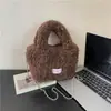 Bolsa de felpa retro para mujer, nueva y elegante bolsa de hombro cruzada 2026, bolso de mano peludo, bolsa tipo cubo esponjosa