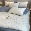 Bolso de mano jacquard estilo coreano juego de ropa de cama de cinco piezas, juego fresco y simple de cuatro piezas para uso doméstico, funda de edredón suave, disponible para venta al por mayor