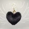 Colgante Llavero para Coche con Forma de Corazón Pelota de Felpa Linda Encanto para Bolso Forma de Corazón Regalo de Cumpleaños para Mujeres