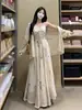 Vestido francés de talla grande para mujer con figura de pera, conjunto de dos piezas de vestido tirantes estampado vintage de otoño con cárdigan hueco de manga larga