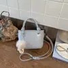 Bolso cubo de moda y sencillo para mujer, gran capacidad, nuevo de la primavera 2026, elegante estilo vintage, para el trabajo y los desplazamientos, bolso de hombro