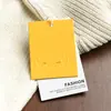 Etiqueta colgante etiqueta colgante de alta gama con textura de cáscara de huevo etiqueta colgante personalizada sin color con textura en relieve etiqueta colgante de ropa etiqueta para prendas de vestir