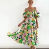 Vestido holgado sexy de estilo europeo y americano con estampado bohemio y un solo hombro, ideal para vacaciones, de la colección 2025.