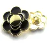 Venta al por mayor de fábrica punto metal aleación aceite moda cara sonriente botón personalidad pie alto botón para coser a mano ferretería joyería