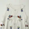 Atacado para comércio exterior 2026 Moda casual europeia e americana colete bordado sem mangas de abotoamento simples para mulheres D17389