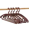 Colgador de plástico de hombro ancho directo de fábrica tienda de ropa antideslizante sin costuras para colgar abrigos adulto hogar secado colgador venta al por mayor