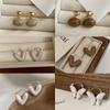 Pendientes vintage de bola de esmalte de caramelo para mujer, pendientes de otoño e invierno 2023, nuevos pendientes de temperamento de lujo ligeros y populares de alta calidad.