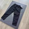 Ropa de Trabajo al Aire Libre Americana Funcional Etiqueta Pequeña Blanca Holgada Versátil Casual Streetwear Casual para Hombres y Mujeres Pantalones Largos de Secado Rápido para Hombres