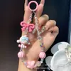 Muñeca de Dibujos Animados Popular con Cuentas Cadena para Teléfono Móvil Colgante para Bolso de Cristal para Mujer Cordón Antirrobo para Teléfono Móvil Llavero de Mano