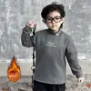 Ropa interior térmica con forro polar para niños Otoño Invierno 2026 Ropa nueva para niños Cuello alto medio Ropa de invierno engrosada Camiseta cálida para bebé niño