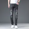 2026 Jeans Bordado Macio Versão Tendência Masculina Estilo Fino Calça Longa Slim Fit Perna Afunilada Primavera Verão Novo Estilo