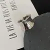 Anel liso com grande arco côncavo-convexo, estilo minimalista chic ins cool transfronteiriço europeu e americano, joia feminina moderna e de alta qualidade