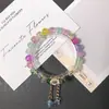 Pulseras para estudiantes al por mayor, pulseras de cuentas de cristal de camelia, populares accesorios de mano de margaritas pequeñas de colores para puestos del mercado nocturno