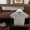 Traje estilo Academia para niñas Primavera y Verano 2025 Camisa Polo de Punto de Manga Corta Estilo Occidental para Bebé Niña Falda Corta Plisada Vestido de Verano