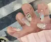 30 Piezas de Puntas Populares de Uñas Artísticas Domésticas, Colección Dulce y Linda de Nudo de Lazo Ojo de Gato Estilo Francés, Puntas de Uñas Portátiles al por Mayor
