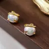 Brincos Originais de Prata 925 Novos de Designer para Mulheres Europeus e Americanos High-end Light Luxury Brincos de Pérola Barroca Atacado