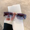 Nuevas Gafas de Sol de Moda Transfronterizas para Hombres, Elegantes y Atractivas Gafas Cuadradas Metálicas Sin Marco para Mujeres