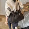 Bolsa de mano retro de gran capacidad para mujer, nuevo estilo 2026, simple y versátil, adecuada para ir al trabajo, se puede llevar debajo del brazo o usar como bolso de hombro o bolso cruzado, con múltiples bolsillos